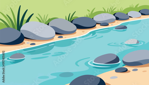 Smooth stones line a sandy bank beside calm blue water and green grass
