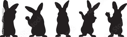 Five rabbits standing on their hind legs silhouette