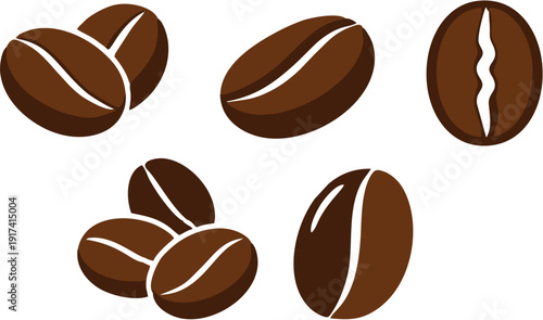 Assorted coffee beans scattered on a plain surface viewed from directly above