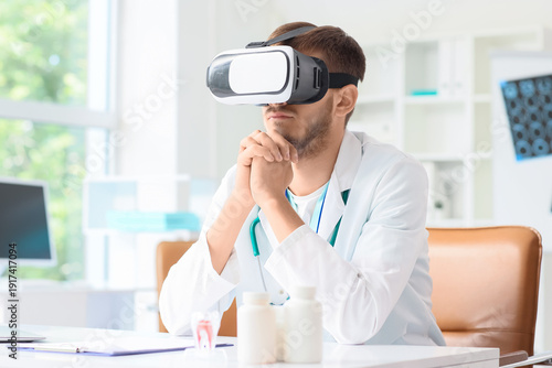 Male doctor with VR glasses...