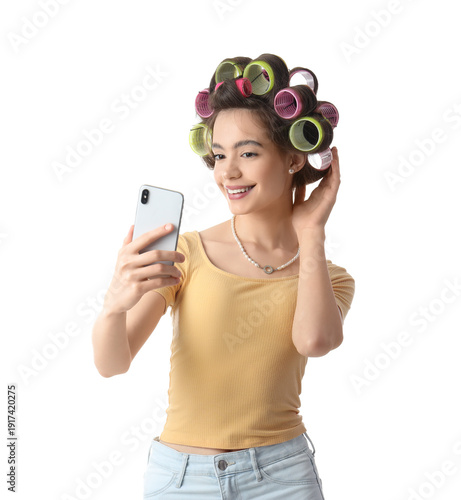 Young woman with hair curle...