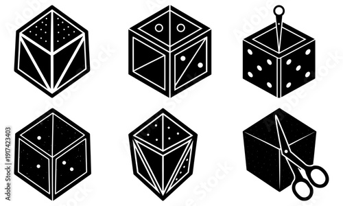 Black dice with white outlines and scissors cutting one