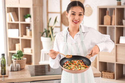 Beautiful young happy Asian...