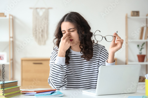 Tired female Indian student...