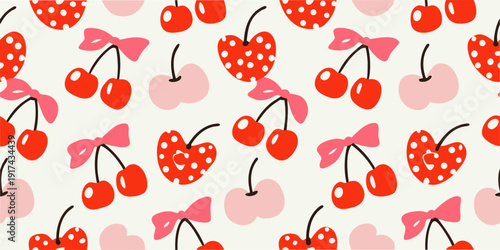 A repeating pattern of red cherries and strawberries with pink bows
