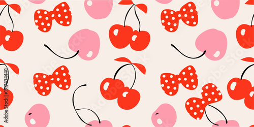 Seamless pattern of red cherries and polka dot bows on a cream background