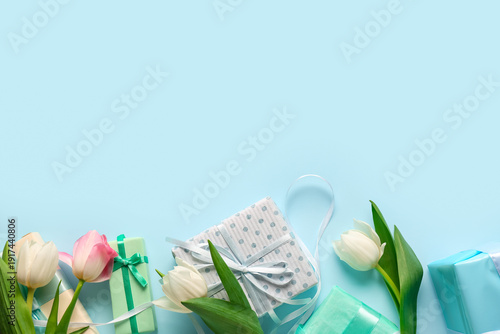 Gift boxes with tulips on b...