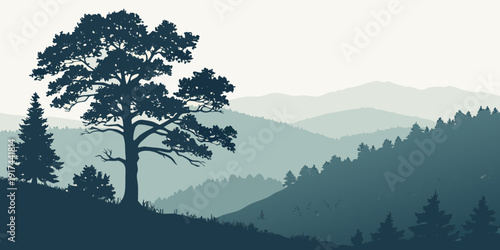 Majestic tree standing tall on a misty mountain ridge at sunrise