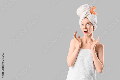 Emotional young woman after...