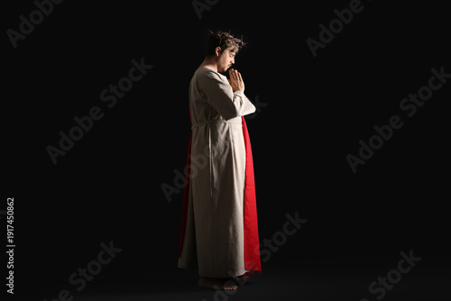 Man in Jesus robe and crown...