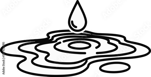 A single drop falls onto a pool of water, creating ripples