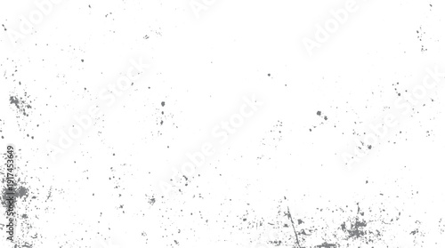 Scattered grey dust particles and smudges on a white background
