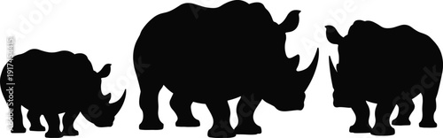 Silhouettes of rhinoceroses in different sizes, vector illustration representing wildlife, animal biology, nature, conservation, and educational themes