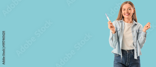 Happy young woman with preg...