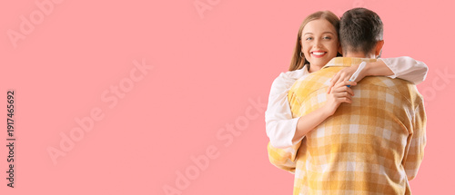 Happy young couple with pre...
