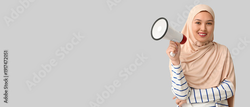 Young Asian Muslim woman wi...