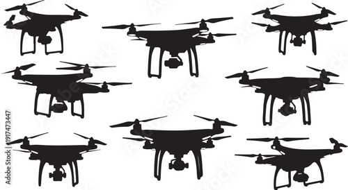 Multiple black drone silhouettes flying in different directions together