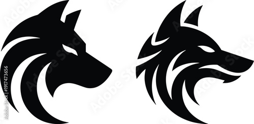 Two black wolf heads facing each other in profile Vector