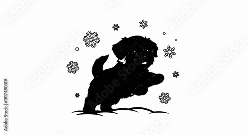 Black silhouette of a fluffy dog playing in the snow