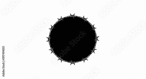 Circular barbed wire enclosure with sharp spikes on white background