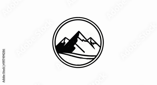 Circular emblem with stark black and white mountain peaks inside