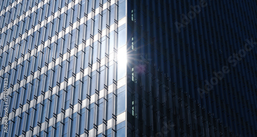 Modern Glass Office Building Facade with Sunlight Reflection