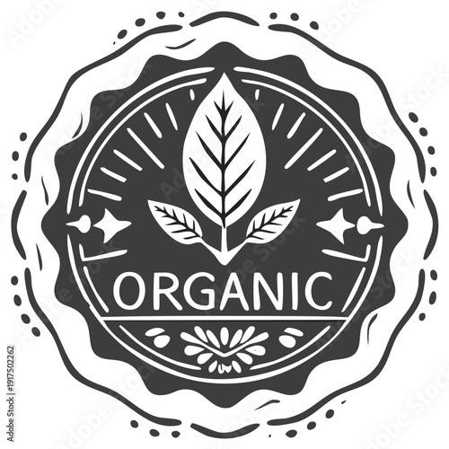 Rustic circular emblem with leaf motif and the word organic symbolizing nature and healthy living