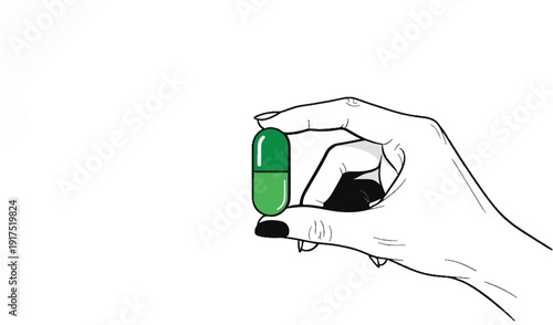 Hand holding a single green capsule against a white background
