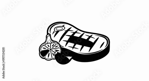 Grilled steak with a slice of lemon and a clove of garlic