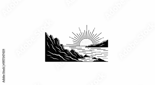 Rocky shore with sunbeams over water at sunrise