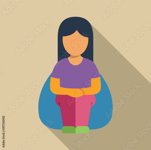 Woman sitting on the floor hugging her knees, experiencing feelings of loneliness and isolation