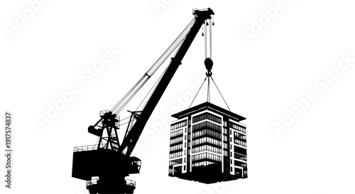 Silhouette of a heavy duty construction crane lifting a modern office building