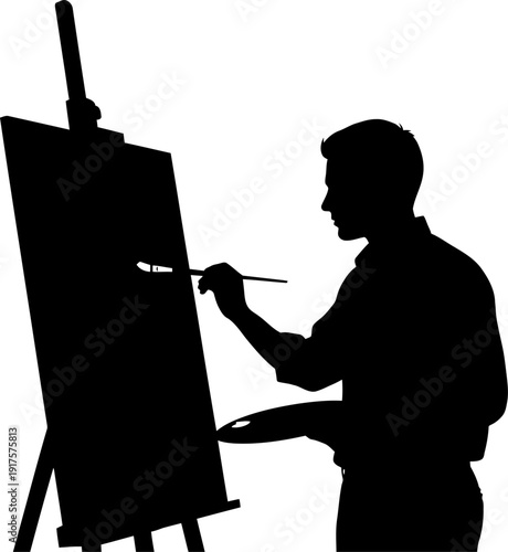 Male artist silhouette painting on a canvas using an easel
