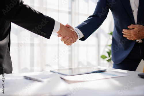 Wallpaper Mural Businessman handshake for teamwork of business merger and acquisition,successful negotiate shake hand with partner in the office
 Torontodigital.ca