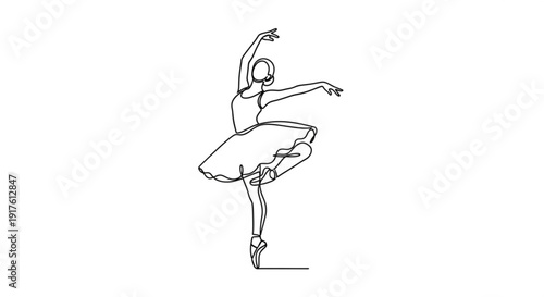 Elegant ballerina dancing en pointe in a graceful pose with arms extended