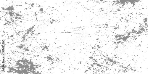 Abstract grunge background featuring a vintage gray concrete wall texture with old paper stains and a rough dirty paint surface design