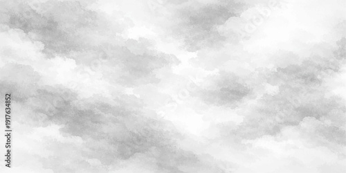 Fluffy white clouds and dark storm clouds drift across a beautiful blue summer sky in a natural cloudscape atmosphere filled with light