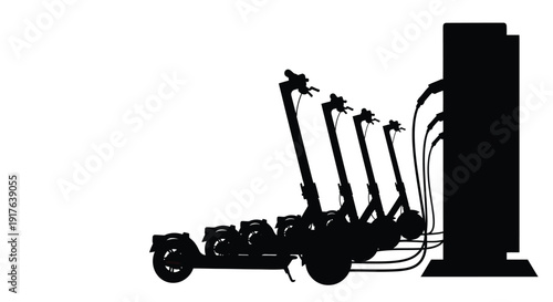 Electric scooters parked against a wall a striking black silhouette