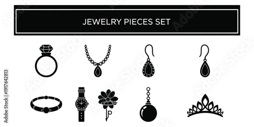 Collection of jewelry pieces including rings and earrings displayed together