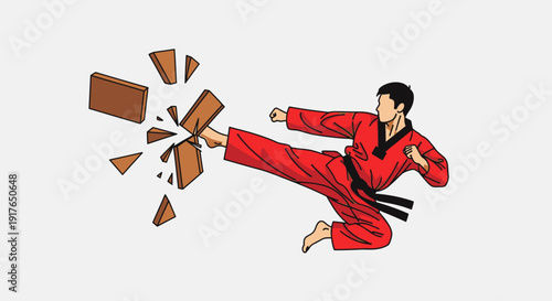 Martial artist kicks breaking boards in action sports event with skill and precision