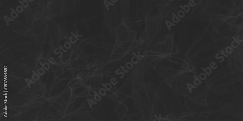 Abstract swirling grey smoke trails on black background. Panoramic view of the abstract fog. White cloudiness, mist or smog moves on black background. black cardboard texture. slate stone wall texture
