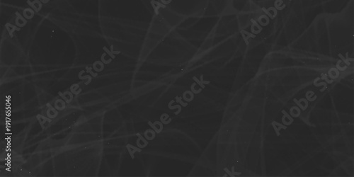 Abstract swirling grey smoke trails on black background. Panoramic view of the abstract fog. White cloudiness, mist or smog moves on black background. black cardboard texture. slate stone wall texture