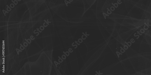 Abstract swirling grey smoke trails on black background. Panoramic view of the abstract fog. White cloudiness, mist or smog moves on black background. black cardboard texture. slate stone wall texture