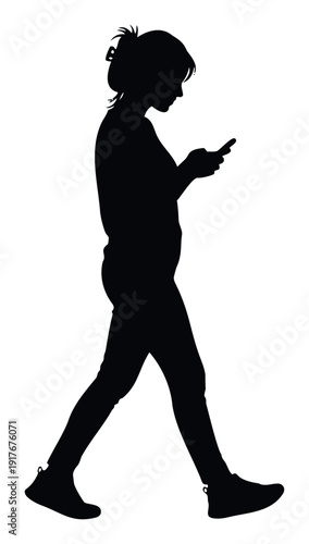 Dark silhouette of a lone pedestrian actively engaging with a mobile phone while on the move, illustrating digital dependency, online interaction, and individual focus on personal devices