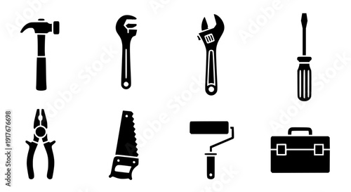 Collection of essential black silhouette icons representing various manual repair tools including hammer pliers adjustable wrench screwdriver handsaw roller, and toolbox graphic elements.