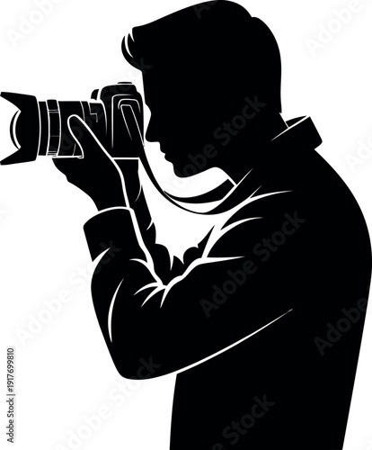 Silhouette of a photographer taking a picture camera