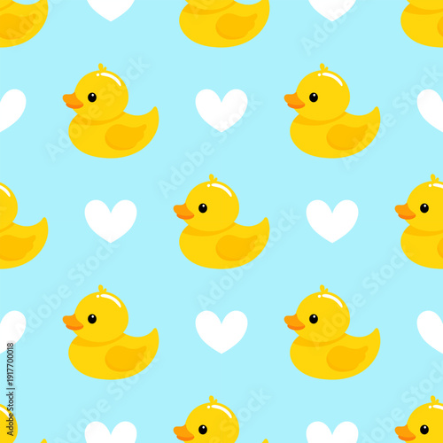 Cute yellow rubber duck seamless pattern with white hearts on blue background for baby shower nursery decor wrapping paper fabric print and kids digital wallpaper
