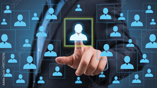 Human resources professional selecting candidate from digital profile interface screen