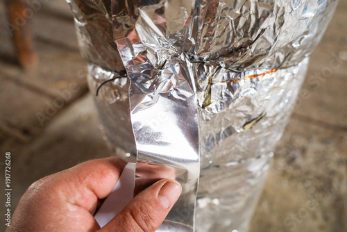 This process demonstrates a stage of technical insulation or structural sealing, highlighting the importance of reliable protection and the use of professional materials during repair or installation 