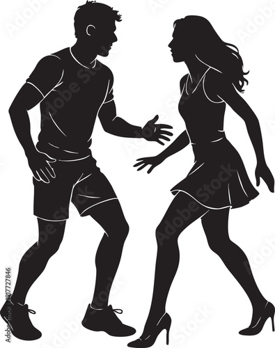 Man and woman in silhouette dancing together in casual wear